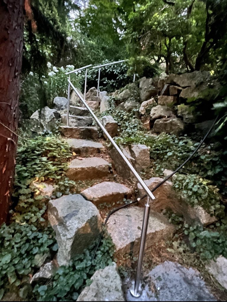 Handrails for Stairs: Natural Stone Stairs with Elegant Handrail Design