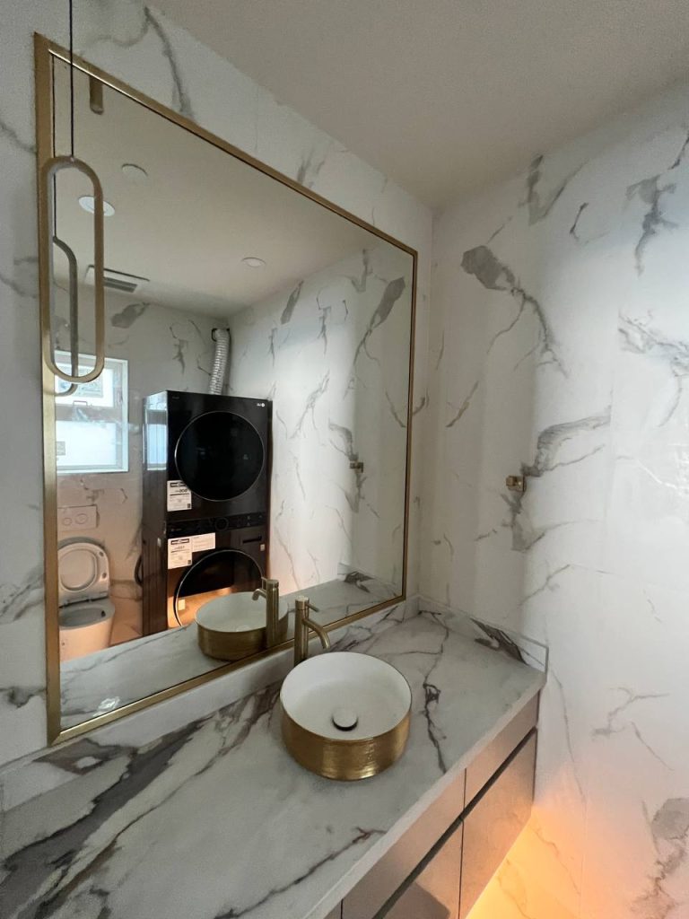 Steam shower gold trim mirror