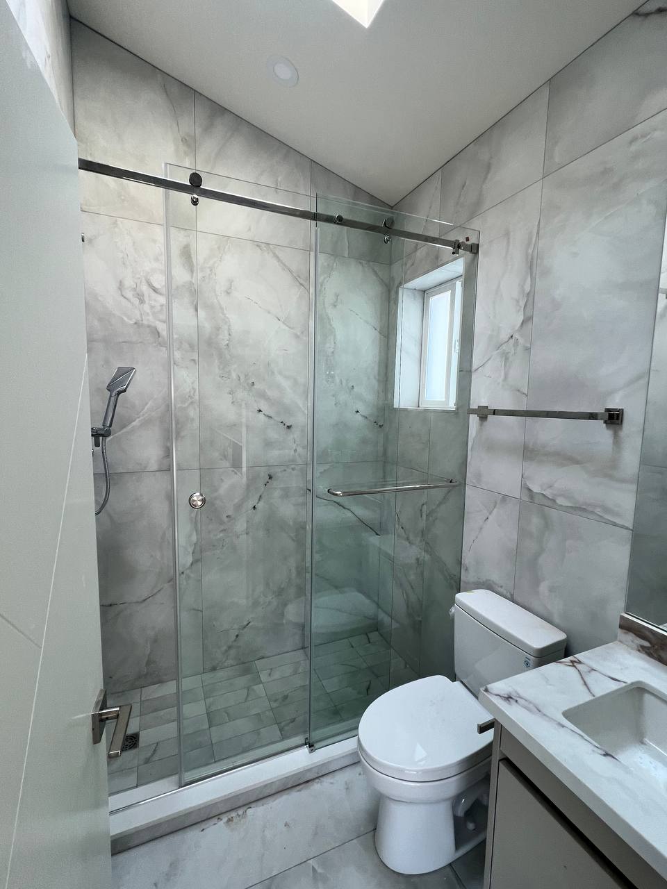 Custom frameless shower glass enclosure by Belcarra Glass