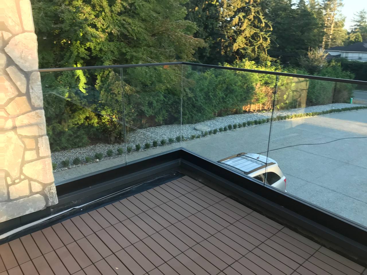 Custom glass railing installation by Belcarra Glass